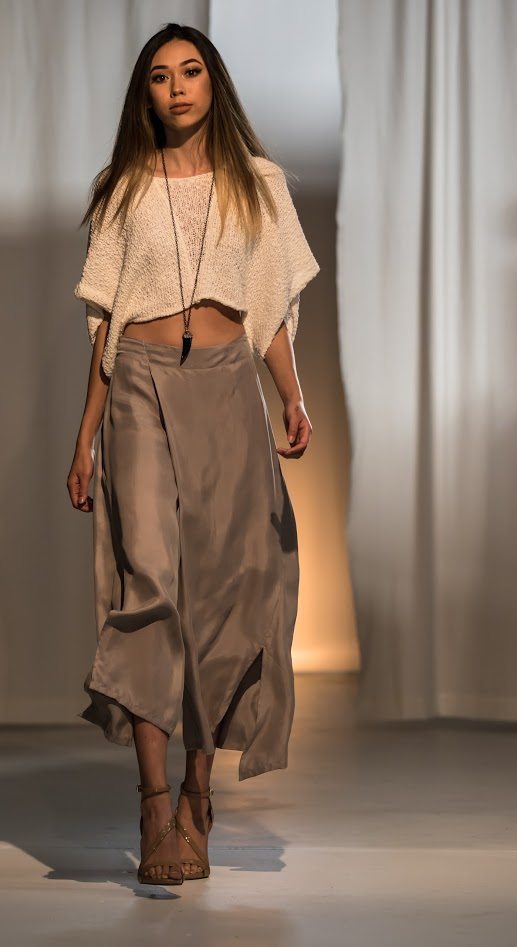 I guess could be called a long skort? You can see the clever design elements in how beautifully the front overlays the the other pant leg. The look has a feminine flowing feel that is Chic for ANY age. Maybe not the crop top, but definitely the skirt/pants. 